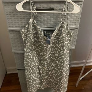 Abercrombie button front detail dress. Has pockets. Tie strap. Mini length